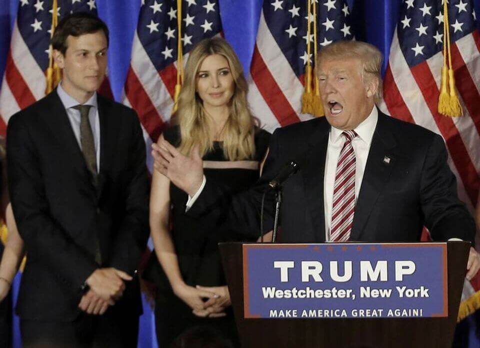 Donald Trump speaks as his son-in-law Jared Kushner.