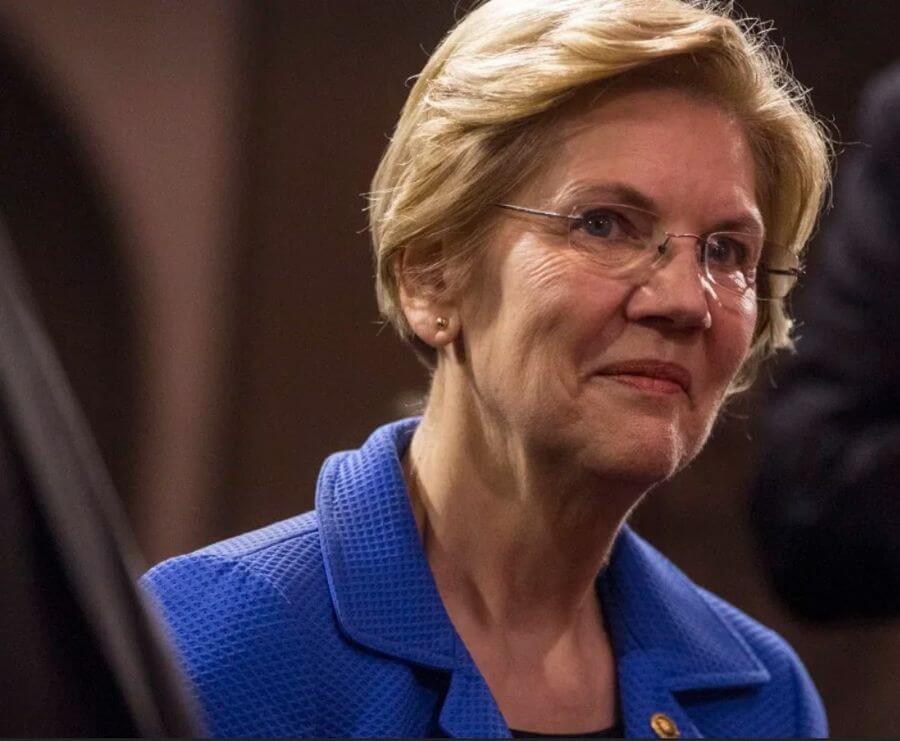 Elizabeth Warren is pictured during a mock swearing in ceremony with Vice President Mike Pence on Capitol Hill.